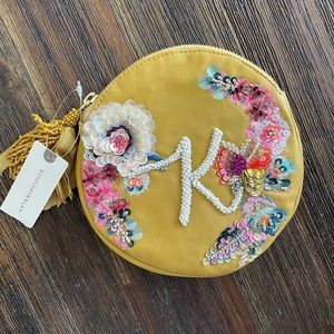 Anthropologie | K beaded leather clutch